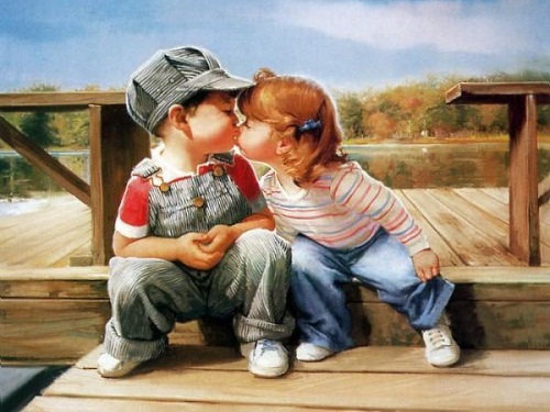 мальчик и девочка целуются, сидят рядом